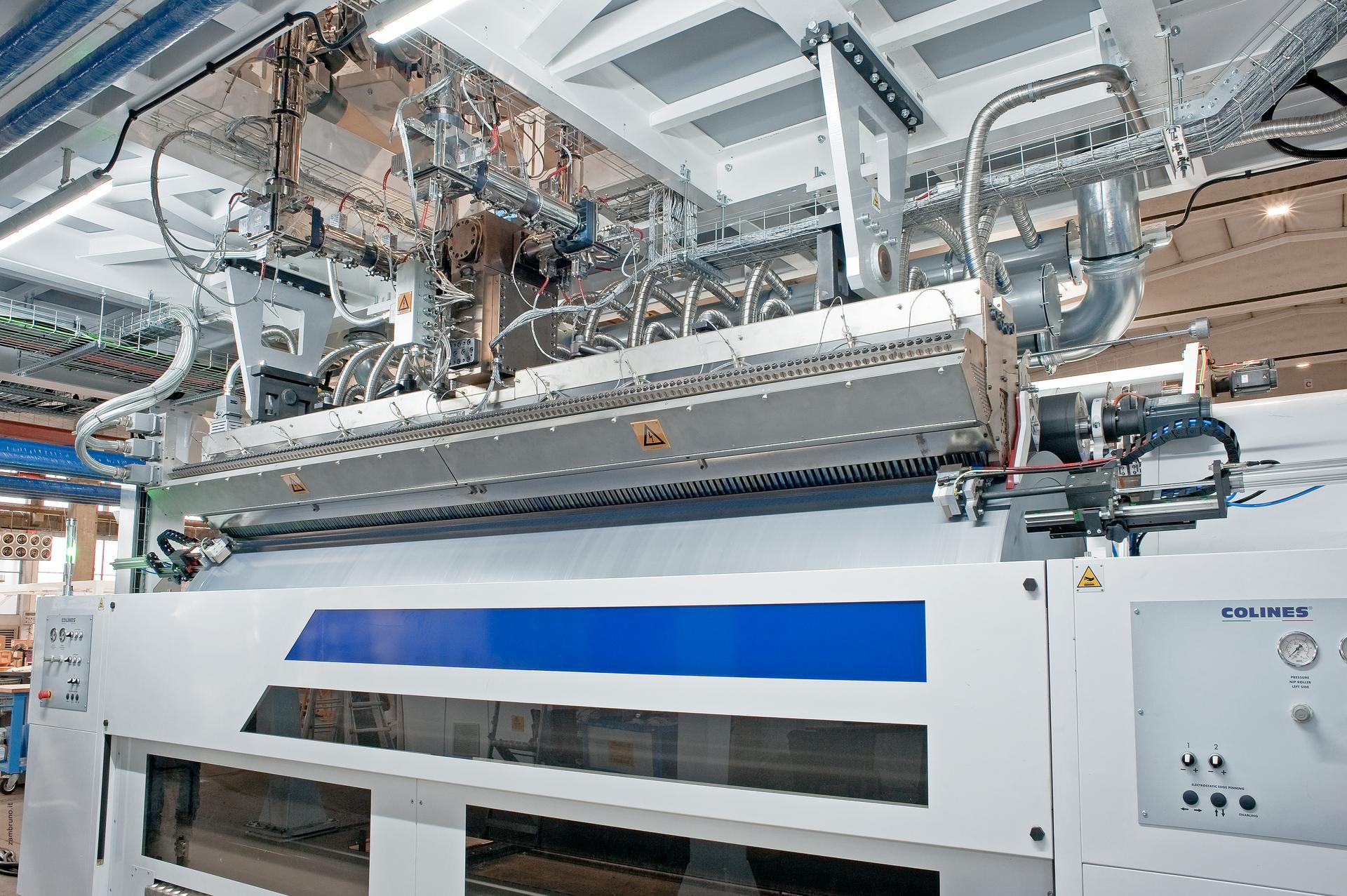 A view of extrusion die and chill-roll on a COLINES® ALLRollEX® cast stretch film lin