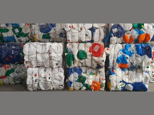Baled waste HDPE can