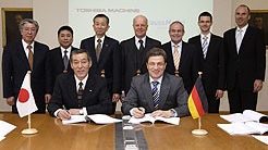 KraussMaffei and Toshiba 