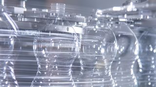 100,000 bottles per hour