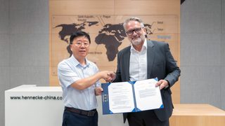 Hennecke and Yizumi join 