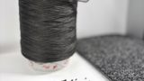 Neumag BCF tests PET recycling in a carpet-to-carpet system